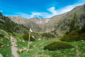 Hiking in mountains in summer at Parc Natural del Comapedrosa, Andorra