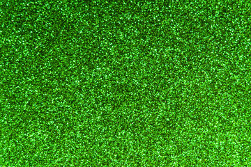 Fototapeta premium Texture of green colored foamiran sheet with sparkles