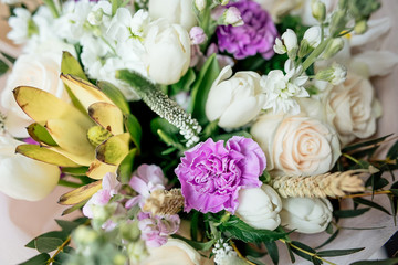 bouquet of flowers with lilac carnations white roses, close up
