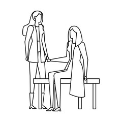 elegant businesswomen seated in the park chair