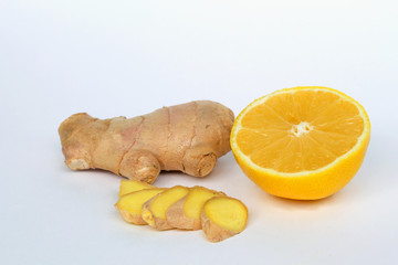 Fototapeta na wymiar Fresh ginger and lemon isolated on white background