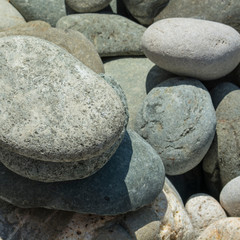 Abstract smooth round pebbles sea texture background