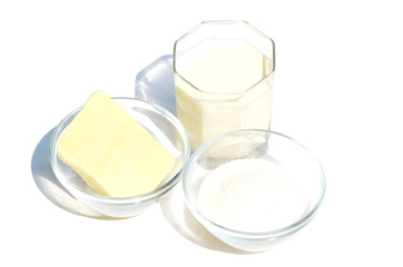 Glass of milk , butter and sugar isolated on white background,dairy products,photo