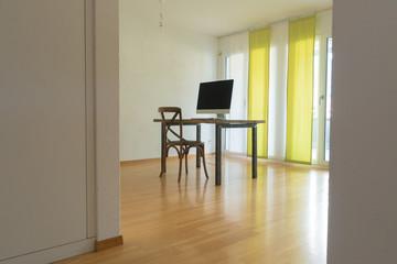 bright and spacious home office with minimalism style furniture