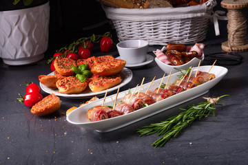  dates wrapped in bacon and delicious tapas