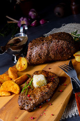 Butter Beef Steak with herbs and potato wedges