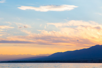 soft sunset sky. pink and gold clouds. High mountains. Natural background.