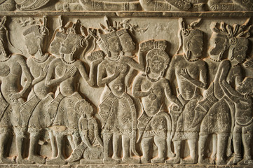 bas-relief of dancing women images on the wall of Angkor Wat Cambodia