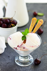 Homemade ice cream with cherry and amaretto.