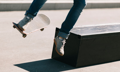 young man doing trick on skateboard