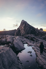 Fototapeta na wymiar summit view with man at sunrise