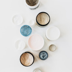 Healthcare, spa, beauty collage with cream assortment on white background. Flat lay, top view skin care concept.