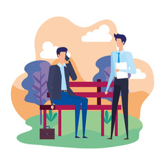 elegant businessmen calling with cellphones in the park chair