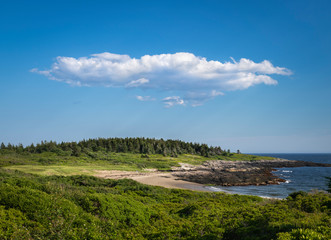 Fototapeta na wymiar Long Cloud Over a Maine Ocean Peninsula