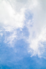 Obraz premium The white clouds in the light blue sky in the sunny day.