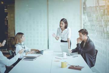 Start-up Asia business team in meeting and helped analyze the marketing problems of the company. Start up new projects concept