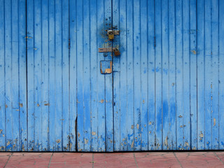 traditional blue wood door of old home