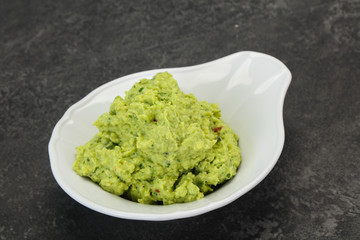 Avocado guacamole sauce with chili pepper
