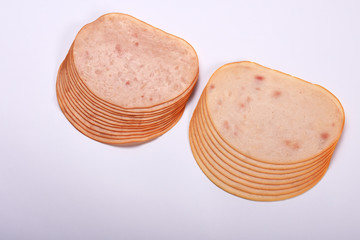 Smoked slices ham isolated on white with copy space