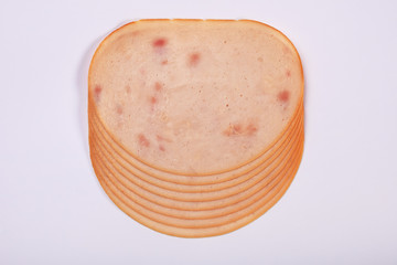 Smoked slices ham isolated on white