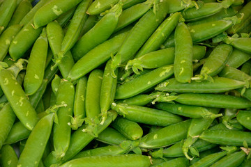 selective focus, green background, fresh green peas