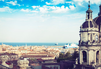 Domes of the Cathedral dedicated to Saint Agatha. The view of the city of Catania, Sicily, Italy .