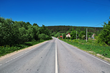 Fototapeta na wymiar The road on forest in Russia