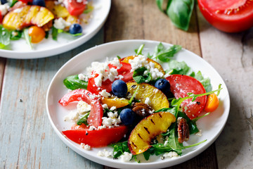 Grilled peach and heritage tomato salad