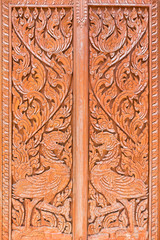 Bird carved wooden door.