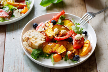 Grilled peach and heritage tomato salad