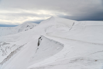 Fototapeta na wymiar freeride skiers in mountains