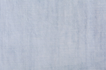 Close-up handmade natural cotton, linen old fabric textile cloth in light blue green vintage retro color for abstract background of book cover -