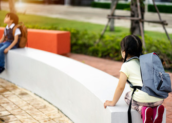 Cute boy and girl carrying backpack, preparing to go to kindergarten.Go to school.education.study.Children have fun playing with friends at school.