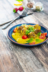 6 vegetable balls and quinoa , curry coconut cream