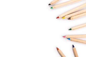 Wooden colorful ordinary pencils isolated on a white background