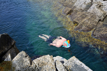 Man Snorkeling in a Natural Pool in Fuerteventura, Canary Islands