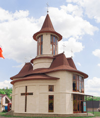 Fototapeta premium Orthodox small church in the suburbs