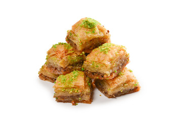Pistachio baklava on a white background. Dessert.