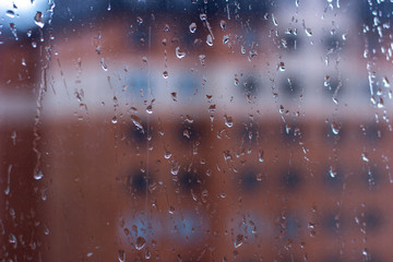 Wet glass 1. Wet glass in a summer dawn. Raindrops on glass. Raindrops on the window.