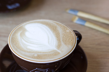 Busan, Korea, 12/22/2018 , delicious Cappuccino with flower decoration prepared in a cafe' in Busan, Korea.