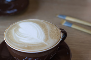 Busan, Korea, 12/22/2018 , delicious Cappuccino with flower decoration prepared in a cafe' in Busan, Korea.