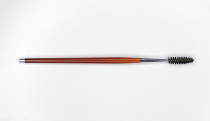 Isolate cosmetic brush on the white texture 