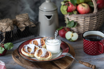 Fresh homemade pancake with apples, honey and cinnamon
