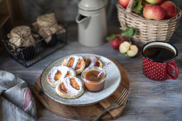 Fresh homemade pancake with apples, honey and cinnamon