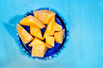 Ripe pieces of melon fruit
