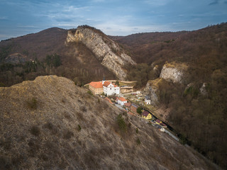 Saint John under the Cliff is a village in the Central Region , district of Beroun , about 30 km southwest of Prague, less than 5 km east of Beroun. Lies in the heart of the Protected Landscape Area.