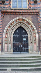 View of beautiful decoration door of the city hall in the historical center, Bremen, Germany