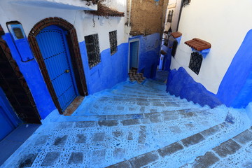 Blue street walls of the popular city of Morocco, Chefchaouen. Traditional moroccan architectural details. - 281640975