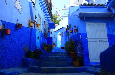 Blue street walls of the popular city of Morocco, Chefchaouen. Traditional moroccan architectural details. - 281641100