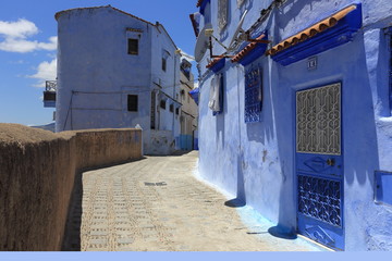 Blue street walls of the popular city of Morocco, Chefchaouen. Traditional moroccan architectural details. - 281641142